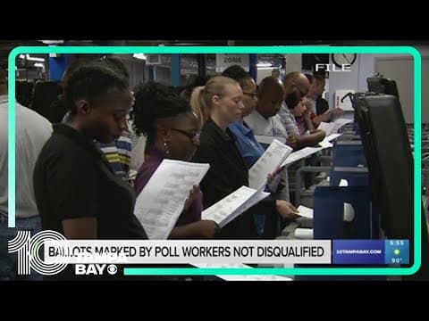 No, poll workers cannot 'disqualify' your ballot by writing on it