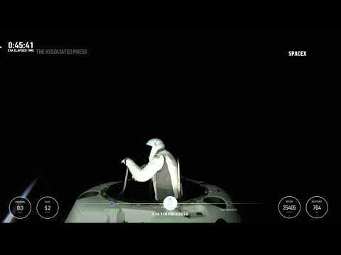 Tech billionaire steps out of SpaceX capsule first private spacewalk high above Earth