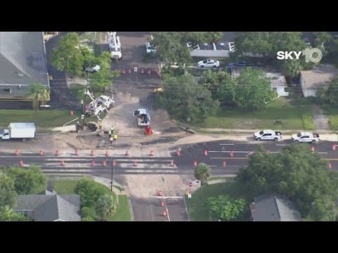 Depression forms on St. Pete roadway after car hits fire hydrant, power pole