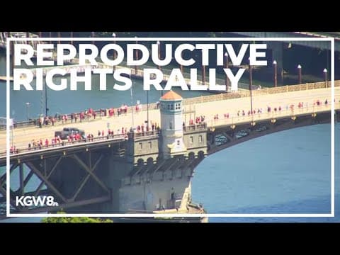 Reproductive rights advocates gather on Burnside Bridge for Women's Strike