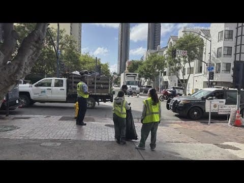 San Diego Police clear problem area in front of tour guide company in downtown