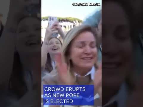 Smoke pours from the chimney atop Sistine Chapel as new pope is elected