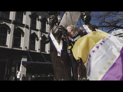 Knoxville Chapter of the Suffrage Coalition decorates women's suffrage statue in Market Square