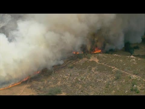 Fire burns east of Ramona on Highway 78