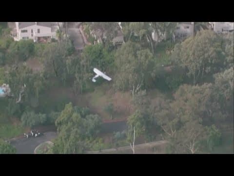 Aerials above: A small plane crashed into La Jolla hillside, killing pilot