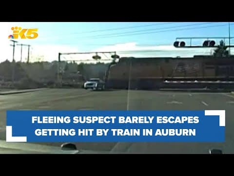Fleeing suspect nearly misses train in Auburn