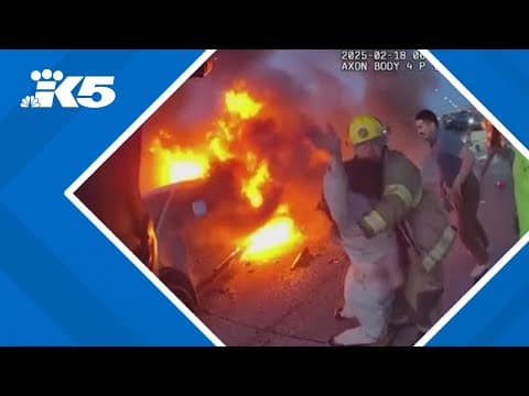 Off duty police officer, firefighter save woman from burning truck