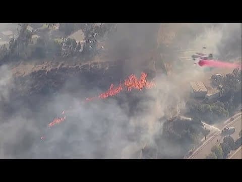 Brush fire prompts evacuation warnings in Poway