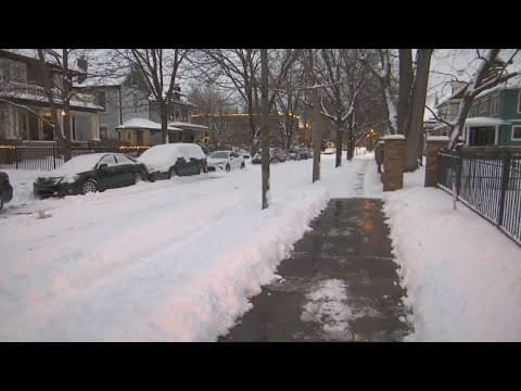 Indianapolis sidewalks still covered in snow after storm