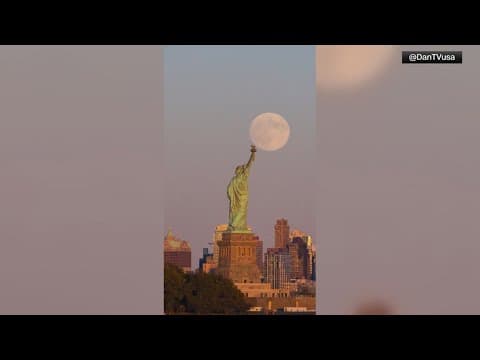 VIDEO: Supermoon rises behind Statue of Liberty