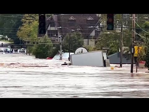 VIDEO: Truck floating away in floodwaters in North Carolina