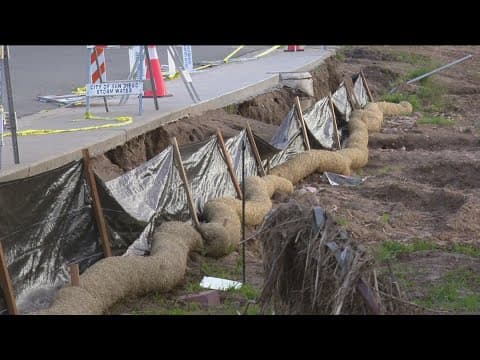 Flood-damaged communities prep for new storm