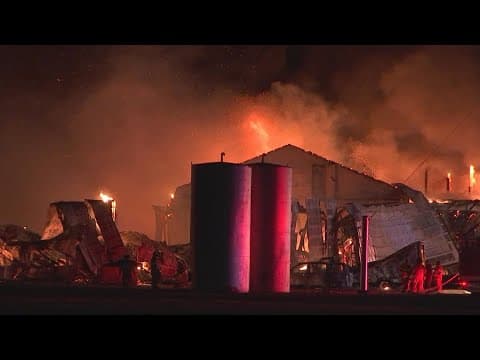 RAW: Firefighters battle flames at Plain City woodworking facility