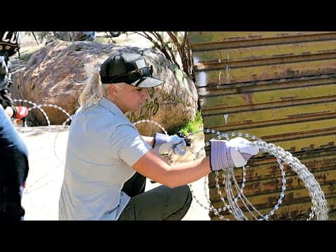 ‘Border Vets’ install razor wire at U.S.-Mexico border wall in Jacumba