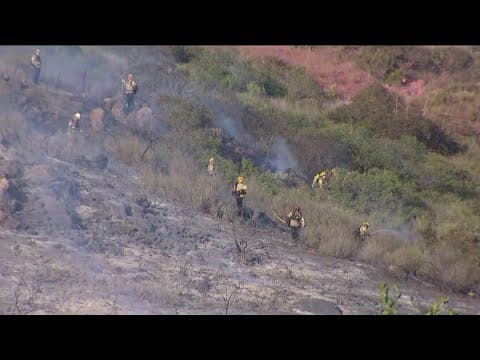 Crews gain control of a fire in Poway that broke out in a canyon
