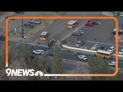 School bus involved in crash near Cherry Creek High School