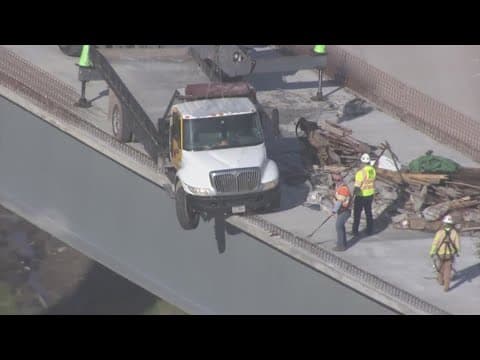 Truck hangs from unfinished flyover at Westpark Tollway near Grand Parkway in Fort Bend County