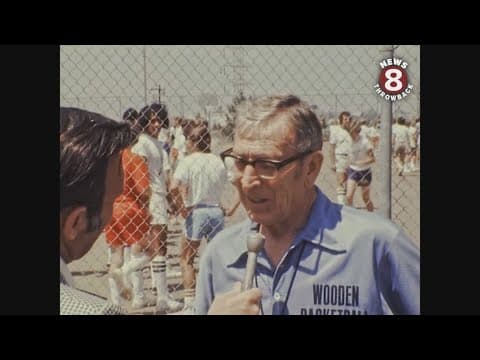 Legendary UCLA basketball coach John Wooden in San Diego for youth camp June 1973
