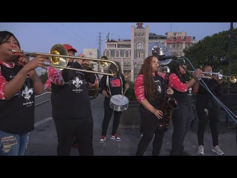 The Original Pinettes Brass Band perform ahead of French Quarter Fest