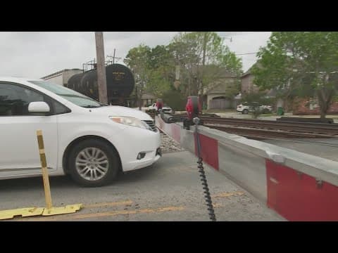 Railroad crossing arms down in Jefferson, which could be dangerous