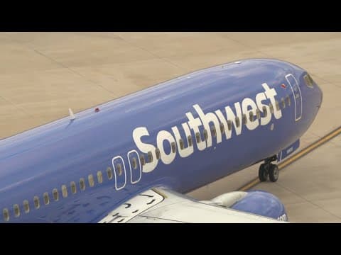 Dallas-based Southwest Airlines says it is ending cabin service earlier to reduce chance of injury