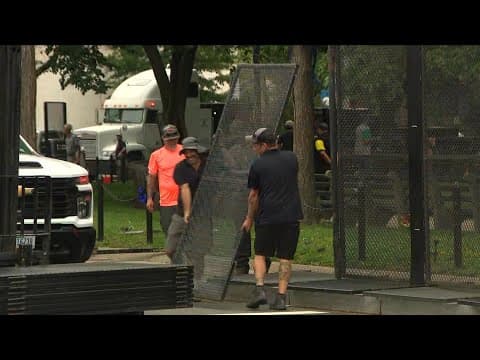 Fencing comes down round Dupont Circle before WorldPride Parade begins