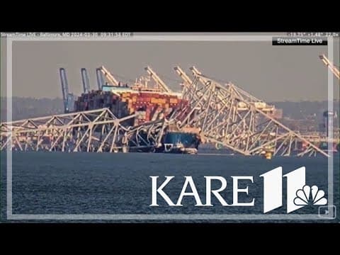 Crane lifts collapsed Baltimore bridge wreckage
