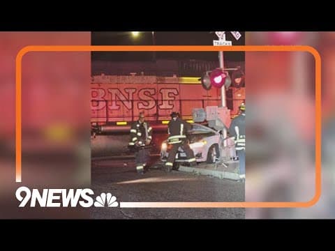 Car collides with train in Commerce City