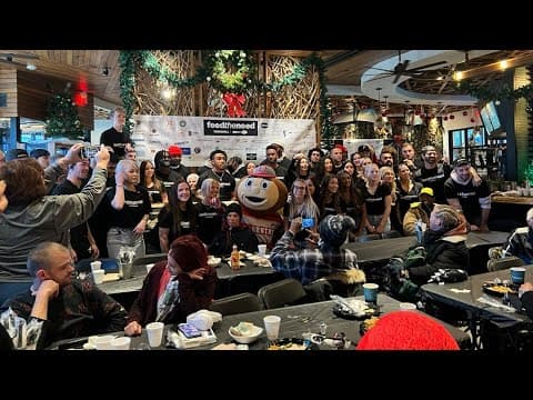 Buckeye football players, Columbus police support those in need this Thanksgiving