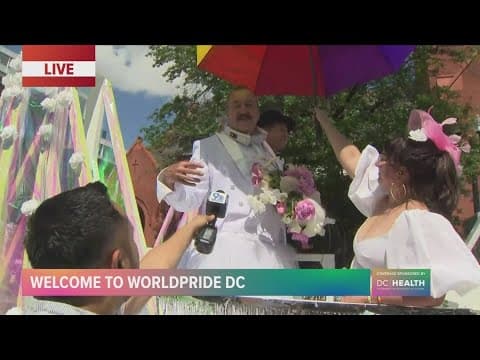Here comes the pride! Freddie's Beach Bar owner gets married on parade float