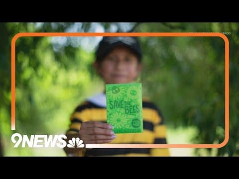 Generation Wild handing out wildflower seed packet to kids